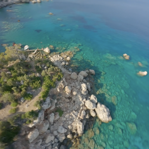 urquoise Tranquility – Aerial View of Rocky Mediterranean Cove
